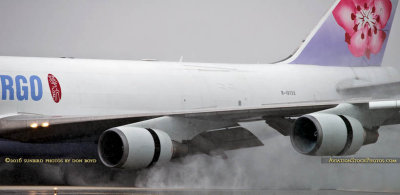 MIA Airfield Tour - China Airlines Cargo B747-409F(SCD) B-18722 reversing thrust in the rain on runway 27 at MIA