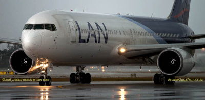 MIA Airfield Tour - LAN Airlines B767-316ER CC-CXI taxiing in after landing on runway 27 before a storm