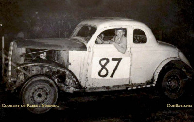 1950 - Robert Manning and his #87 in front of the fans at Opa-locka Speedway