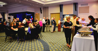 HHS-66 50-Year Reunion and Reunion of the 60's: the food line still winding down on Saturday night at the Milander Center