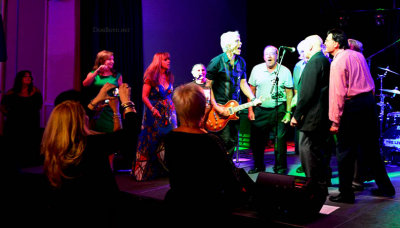 HHS-66 50-Year Reunion and Reunion of the 60's: classmates singing and dancing on stage with the band