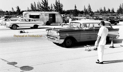 1960's - 1957 Chevy wagon and 1958 Chevy Bel Air drag racing at Master's Field, Dade County