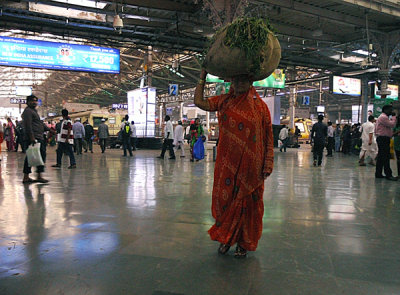 Walking Tall, Victoria Central Station, Mumbai, India.