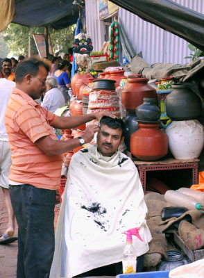 Sidewalk Barber, Mumbai, India.