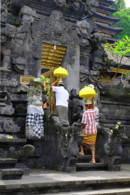 Devotees entering Gua Lawa Temple, Bali, Indonesia.
