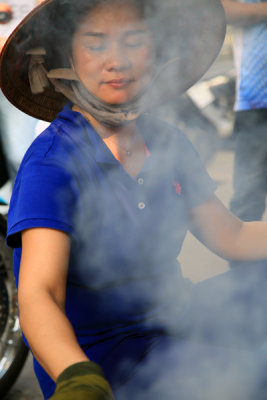 Smoke Gets in Your Eyes - Food Vendor, HCMC, Vietnam.