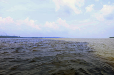 Meeting of the Waters, Confluence of Rio Negro and Rio Solimoes, Manaus, Brasil.