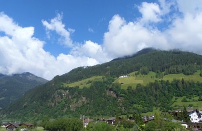 VIEW ACROSS NEUSTIFT TO THE MOUNTAIN ROAD  .  1