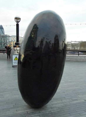 THE LEANING BLACK EGG SCULPTURE