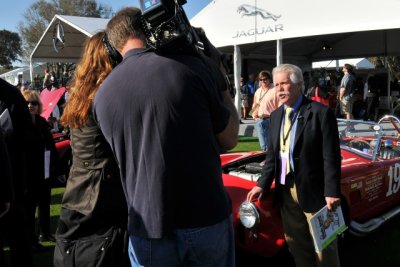 Wayne Carini, right, speaks to the camera crew of his TV program Chasing Classic Cars (0141)