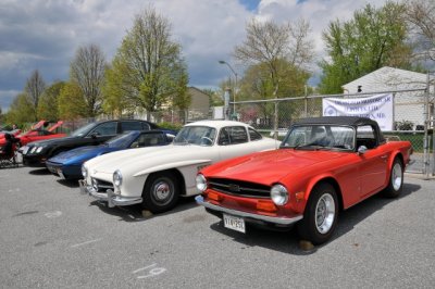 From right, Triumph TR6, 1950s Mercedes-Benz 300 SL Gullwing, 1980s Ferrari 328 GTS and Bentley (6528)
