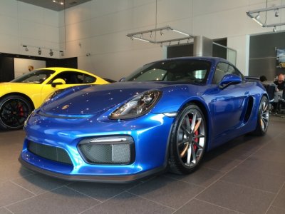 2016 Porsche Cayman GT4, base MSRP about $85,000, but price can easily exceed $100,000 with popular options (iPhone 2338)
