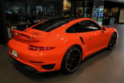 2016 Porsche 911 Turbo in Lava Orange, base price $151,100, actual price $176,650 with options, at Porsche of Towson (8426)