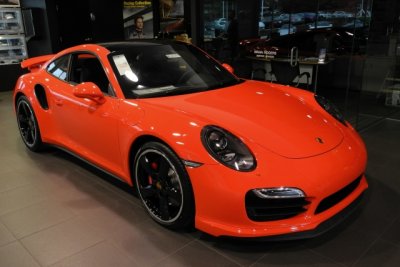 2016 Porsche 911 Turbo in Lava Orange, base price $151,100, actual price $176,650 with options, at Porsche of Towson (8429)