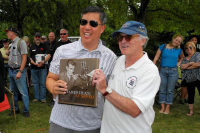 A book on James Dean is awarded as one of several door prizes at PCA National Office Open House. (8743)