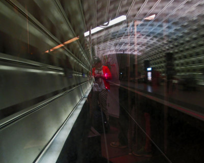 Metro rider reflected