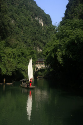 tujia girl on dragon stream.jpg