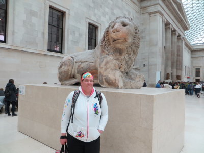 Maureen in front of lion statue in British Museum.jpg