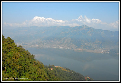 view of the Himalayas over Phewa Lake