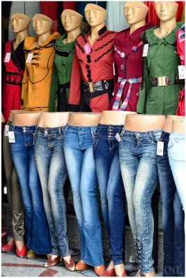 colourful, waisted manteaus and skinny jeans