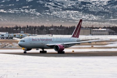 Omni Air International 767 taking off