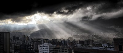 Lightrays over the city of Quito