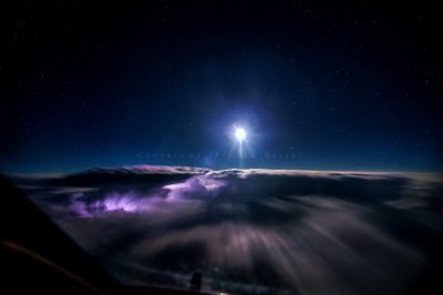 Thunderstorms over Kyrgyzstan with a full moon