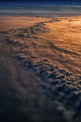 Stratus cloud layer with a low setting sun