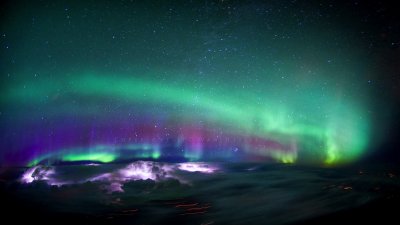Northern Lights and thunderstorms over Canada