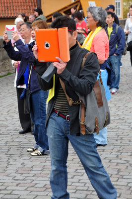 camouflaged photographer