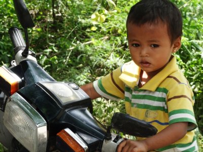 Child on Bike near Shwenandaw Kyaung.jpg
