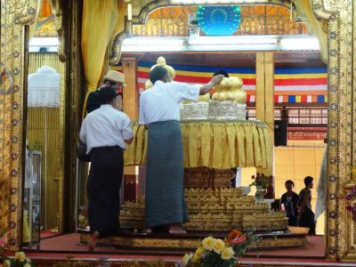 Placing Gold on Buddha Images - Hpaung Daw U Pagoda.jpg