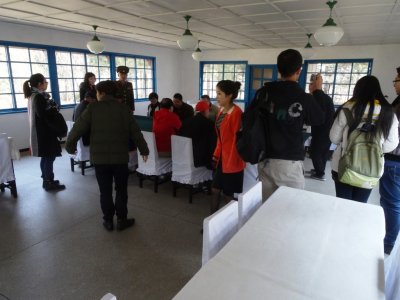 Chinese Tourists - Armistice Talks Hall - Panmunjom DMZ.jpg