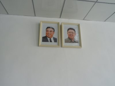 Kim Il-Sung and Kim Jong-Il Portraits - DMZ Visitor Center.jpg