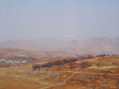 North Korean Countryside - Mountains and Some Farms (3).jpg