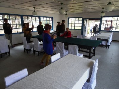 Tourists at Signing Table - Armistice Talks Hall - Panmunjom DMZ (2).jpg