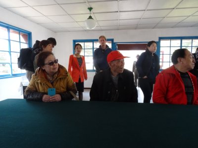 Tourists at Signing Table - Armistice Talks Hall - Panmunjom DMZ.jpg