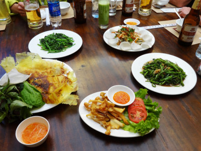 Shared dishes of food for lunch - Hanoi, Vietnam