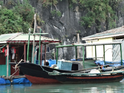 Houses in the floating village of Ha Long Bay, Vietnam