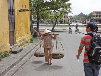 People near the Thu Bon River - Old Town, Hoi An, Vietnam 