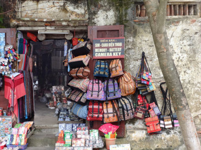 Colorful purses for sale in front of a shop - Old Town, Hoi An, Vietnam