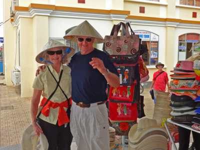 Helen and Stan in their new native hats (to protect them from the sun) - My Tho, Mekong Delta, Vietnam 