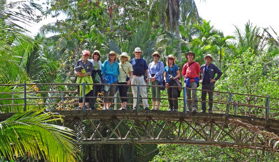 The whole group on a bridge on an island near My Tho in the Mekong Delta, Vietnam