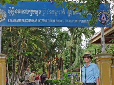 Sally at the Customs Office/Border Checkpoint/ Police Station at the border between Vietnam and Cambodia