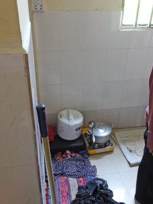Kitchen of our sponsored young ladies seen in the previous photo - a rice cooker and a hot plate - Phnom Penh, Cambodia
