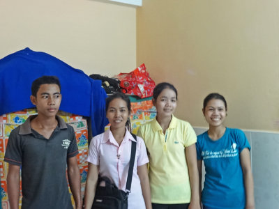 Some of our other sponsored college young ladies in their room with a male cousin of one of them - Phnom Penh, Cambodia