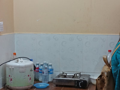 Another kitchen of some of our sponsored college young ladies - a rice cooker and hot plate - Phnom Penh, Cambodia