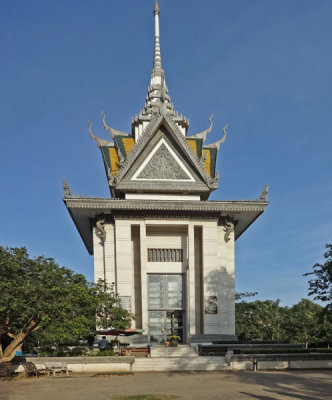 Commemorative stupa filled with skulls of Khmer Rouge victims at the Killing Fields of Choeung Ek - Phnom Penh, Cambodia