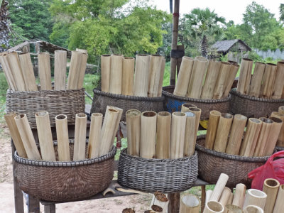 After the woman seen in the previous photo prepared this bamboo, it was filled with sticky rice.