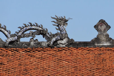 Dragon roofline on a building in the Temple of Lecture - Hanoi, Vietnam